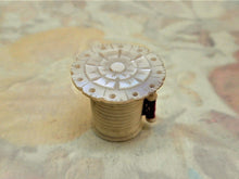 Load image into Gallery viewer, A pearl topped tape measure from a fitted sewing box. c 1850
