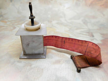 Load image into Gallery viewer, A mother of pearl &#39;coffee grinder&#39; tape measure. 19thc
