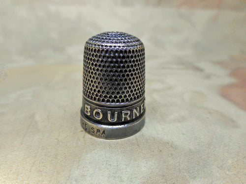 A souvenir from Bournemouth an old silver thimble. 1930