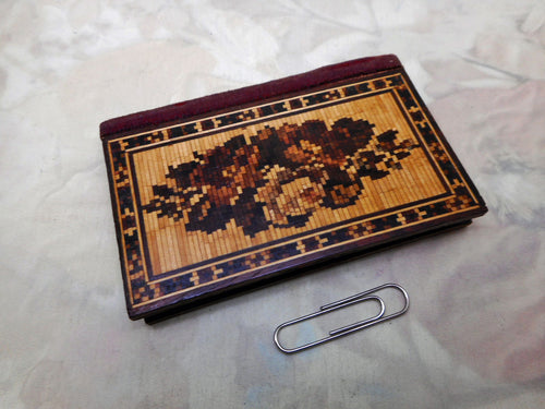 A floraly inlaid Tunbridge Ware needle case in the form of a book. c1860