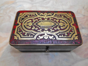 A small Boulle work box with tortoiseshell and brass inlay. French c1870