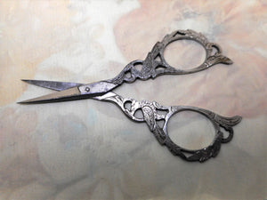 A pair of pierced steel scissors. 'Ricordo di Venezia' c1900-1920.