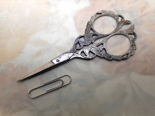 A pair of fancy cut steel scissors c1900