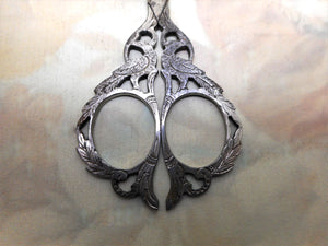 A pair of pierced steel scissors. 'Ricordo di Venezia' c1900-1920.