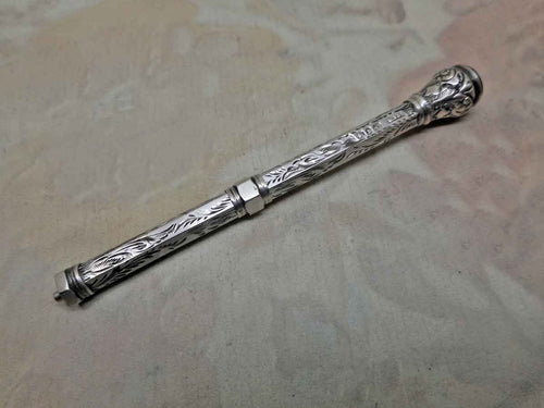 A silver propelling pencil hall marked 1901