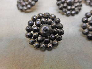 SOLD……Nine small buttons with riveted steel studs. c 1840.