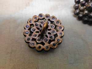 SOLD……Nine small buttons with riveted steel studs. c 1840.