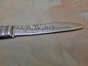 SOLD.............A silver bladed mother of pearl folding fruit knife. Engraved 1807.