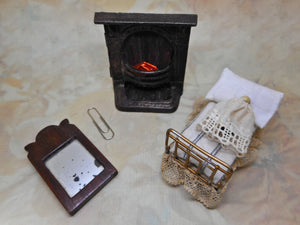 Three items of vintage doll house furniture.