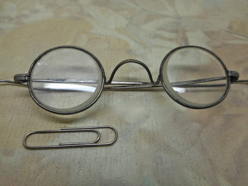 Old round lens spectacles / eye glasses.