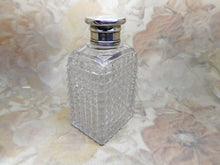 Load image into Gallery viewer, A pair of cut-glass scent bottles with screw on silver lids. c 1860
