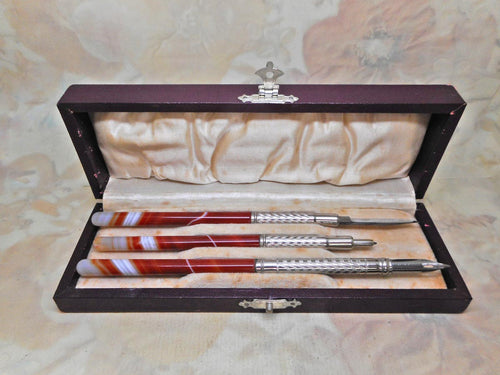 A set of agate handled writing tools. c 1870