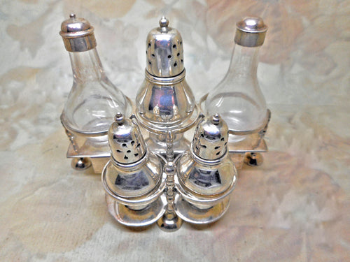 A miniature silver cruet based on an 18th century design. 1927