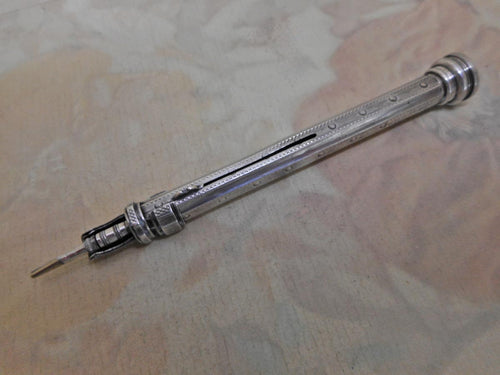 A silver pen / pencil. Wilmot & Co maker. mid 19thc