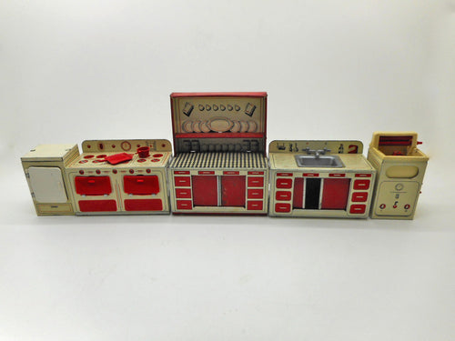 1950s Brimtoy doll house kitchen equipment.