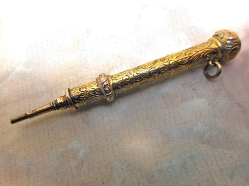 A good quality gilt metal chatelaine pencil. Mid 19thc