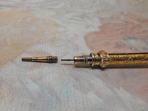 SOLD…….A good quality gilt metal chatelaine pencil. Mid 19thc