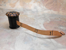 Load image into Gallery viewer, A Tunbridge Ware tape measure with printed silk ribbon
