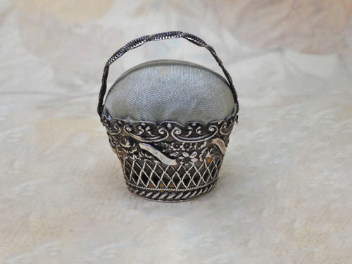 An antique silver pin cushion basket circa 1830