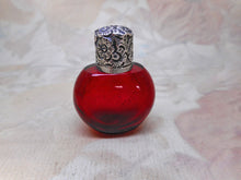 Load image into Gallery viewer, A small ruby glass scent / salts bottle with an embossed silver lid.  19thc
