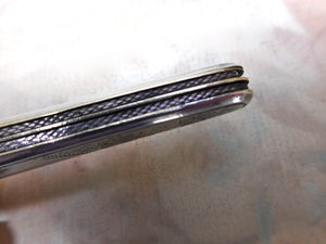 An American sterling silver folding fruit knife. c  1880