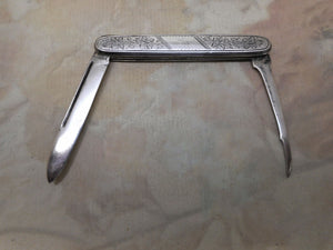 An American sterling silver folding fruit knife. c  1880