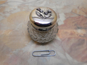 An antique small glass pot the silver lid set with stone thistles. HM. 1904