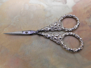 SOLD…….A small pair of silver handled scissors. c1840