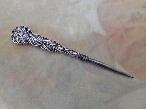 A silver handled stiletto / awl used when sewing. c1830