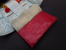 Load image into Gallery viewer, SOLD……A Georgian red leather wallet for embroidery silks. c 1800
