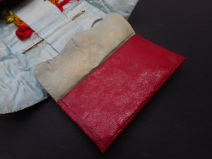 SOLD……A Georgian red leather wallet for embroidery silks. c 1800