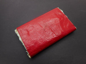 SOLD……A Georgian red leather wallet for embroidery silks. c 1800