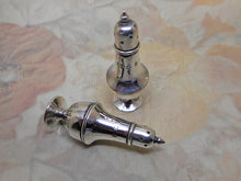 Load image into Gallery viewer, A pair of miniature silver pepperettes, 1897
