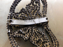 Load image into Gallery viewer, A small steel &#39;butterfly&#39; buckle. French c1900-1920
