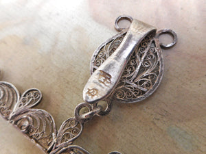A silver filigree spool knave. Central European. 19thc