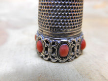 Charger l&#39;image dans la galerie, A German silver thimble with coral coloured beading. Late 19th century.
