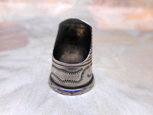 Load image into Gallery viewer, A silver finger guard / thimble. c 1840-1860
