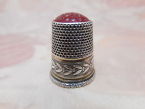 SOLD…..A Continental silver thimble with stone cap. c 1870.