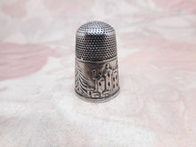 Load image into Gallery viewer, A silver thimble with an embossed image of Windsor Castle circa 1850
