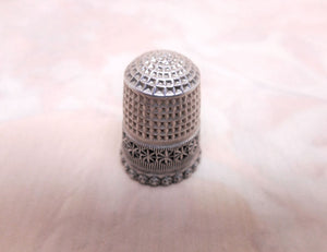 A decorative silver thimble. Charles Horner Chester 1899